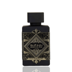 Lattafa Bade'e Al Oud Oud for Glory apa de parfum, detaliu macro cu placheta auriu-stralucitoare si modele geometrice.