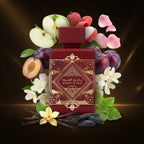Lattafa Bade'e Al Oud Sublime apa de parfum prezentat langa felii de mar verde, litchi, prune si pastai de vanilie.