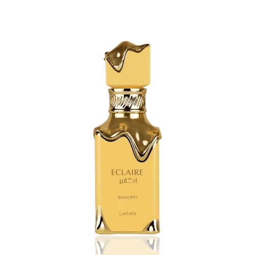 Detaliu flacon Lattafa Eclaire Banoffi apa de parfum, evidențiind finisajul auriu și ornamentele elegante.