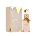 Lattafa  Eclaire apa de parfum, flacon frontal roz-crem pudrat cu detalii aurii fluide.