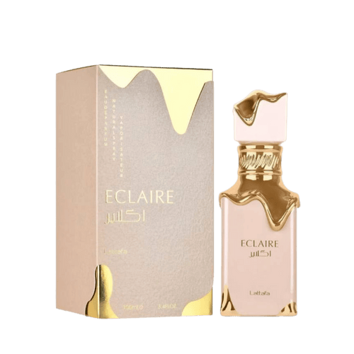 Lattafa  Eclaire apa de parfum, flacon frontal roz-crem pudrat cu detalii aurii fluide.