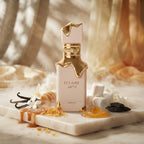 Lattafa  Eclaire apa de parfum original încadrat estetic de ingrediente precum caramel și vanilie.