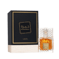 Lattafa Khamrah apa de parfum 100 ml, flacon frontal din cristal greu cu lichid chihlimbariu, parfum original de lux.