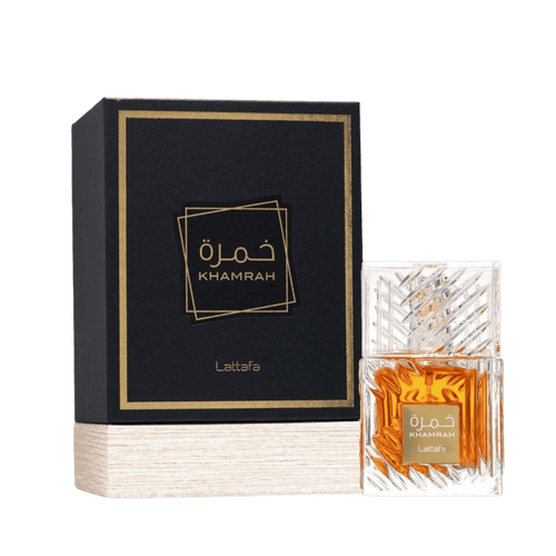 Lattafa Khamrah apa de parfum 100 ml, flacon frontal din cristal greu cu lichid chihlimbariu, parfum original de lux.
