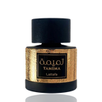 Detaliu flacon Lattafa Tamima apa de parfum, evidențiind textura fină a sticlei și detaliile aurii miniaturale.