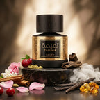 Lattafa Tamima apa de parfum original prezentat alături de fructe suculente, condimente, flori, vanilie și mosc.