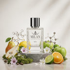 Milan Essence 13 Limited Edition apa de parfum original prezentat alături de felii de pară, măr verde, citrice și mosc.